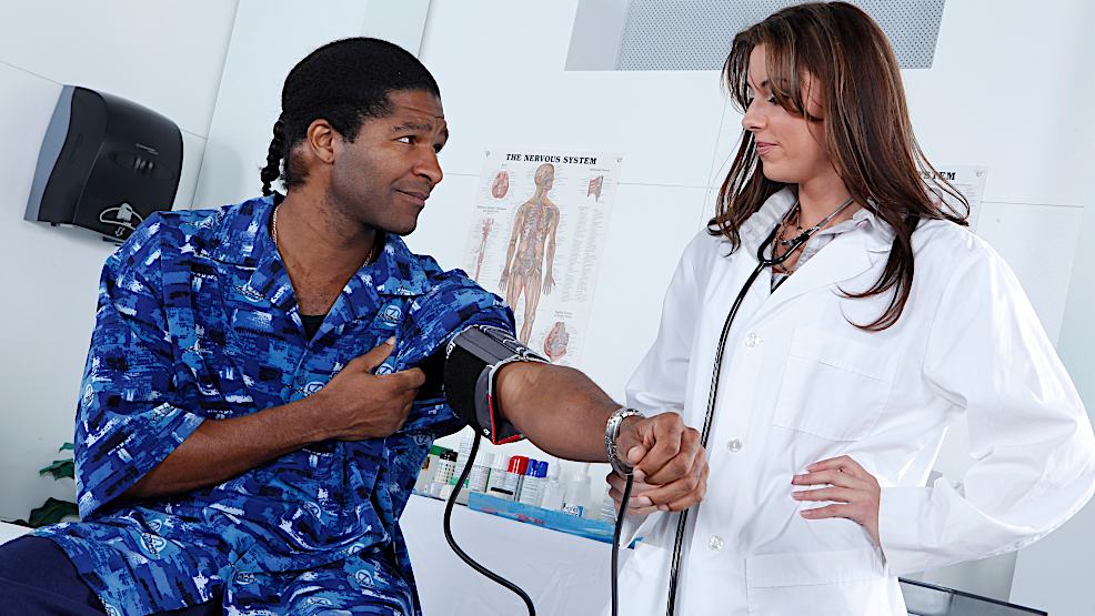 Brunette doctor with glasses rides BBC